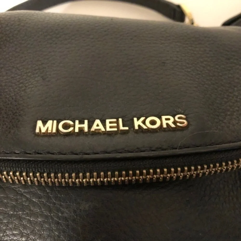 MICHAEL KORS black leather fold over crossbody bag